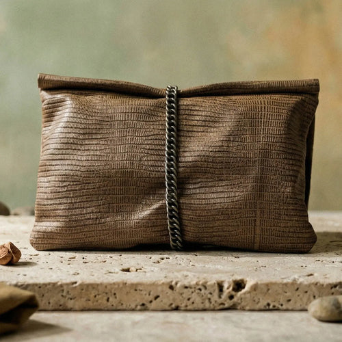 Detail of Limen leather bag showing hand-stitched handles and premium leather quality