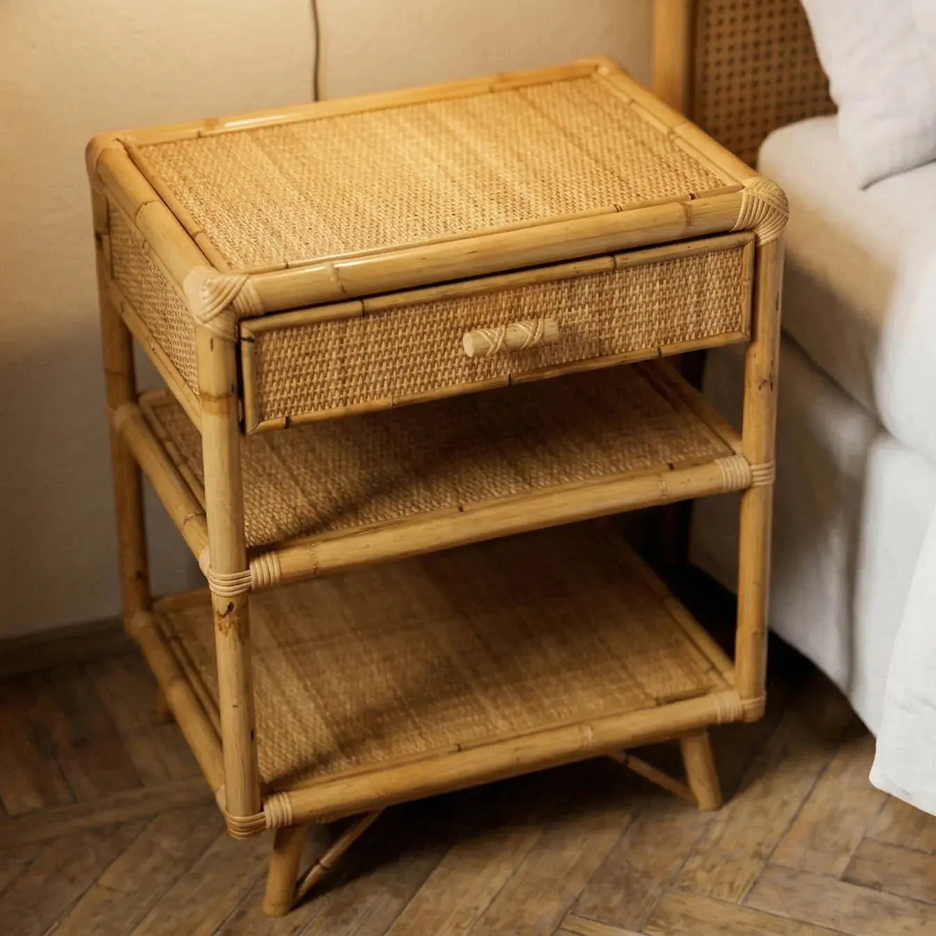 Handwoven rattan basket tray on a marble surface, artisan homeware made in Rome