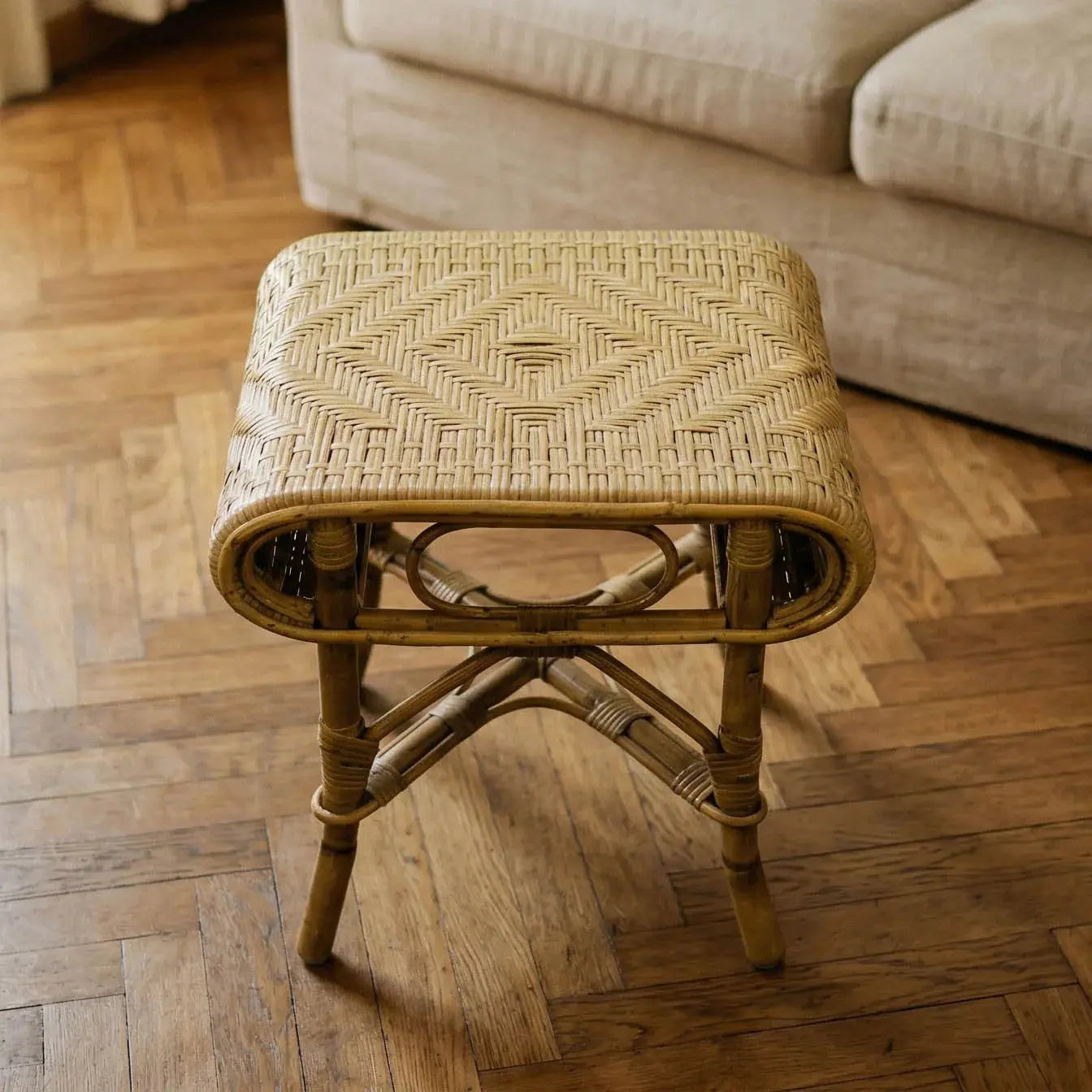 Detail of hand-finished rattan edge on artisan homeware piece