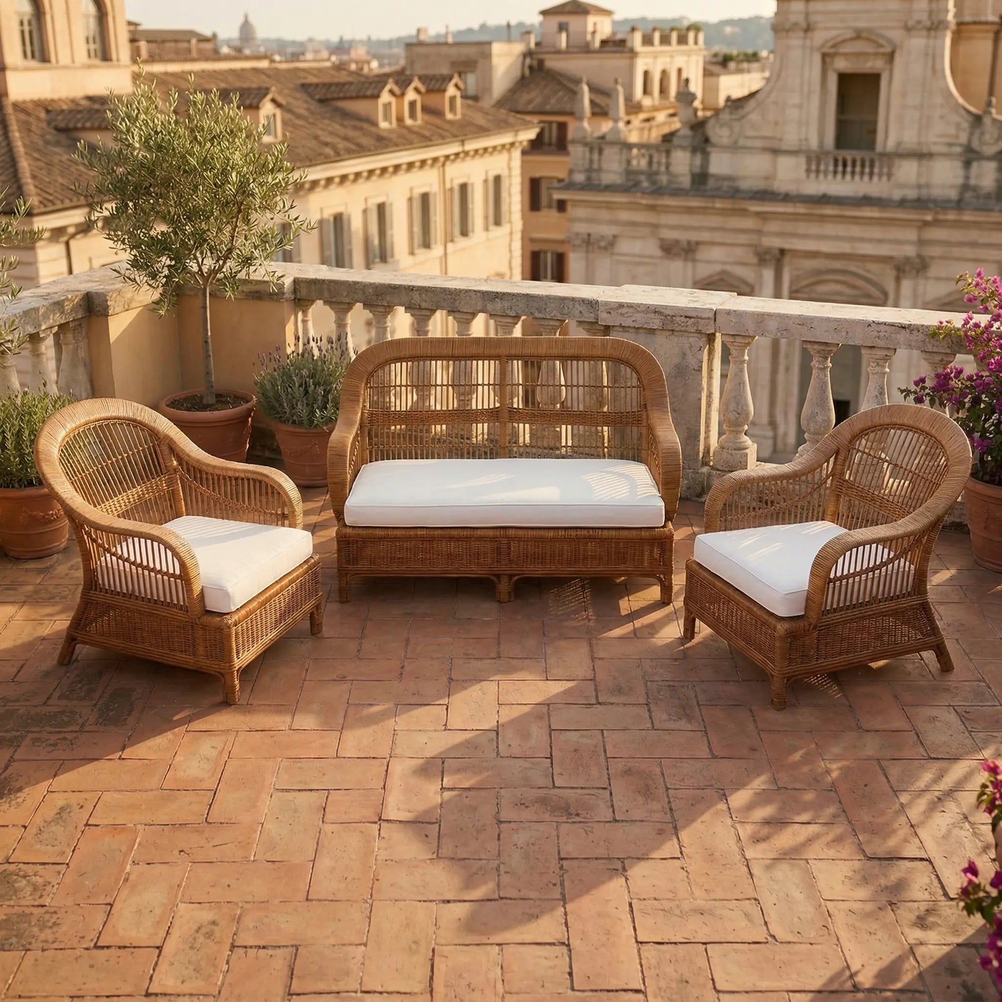 Handwoven rattan sofa and armchair set on an outdoor terrace, Made in Rome